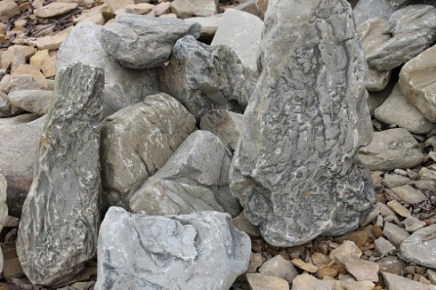 Kamenclub.ru: Песчаник декоративный ландшафтный (фр. 300-500 мм)  купить в Екатеринбурге песчаник желтый рыжий серый зеленый валун речной окатанный природный песчаника 4 500 руб/т   фото КАМЕНЬ КЛУБ